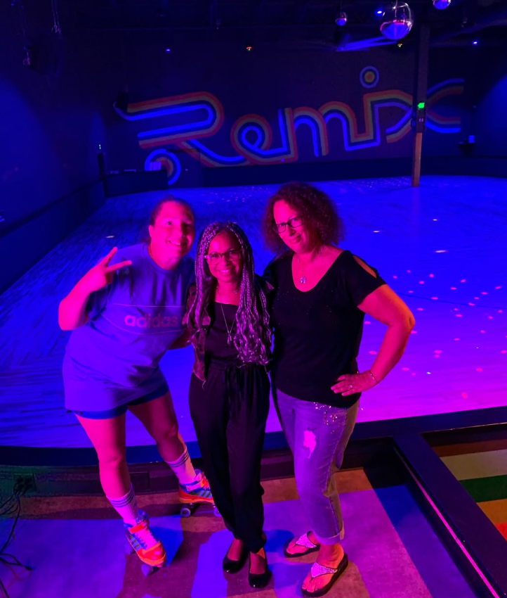 Lara, Mia, and Deirdre together at Remix roller skating rink