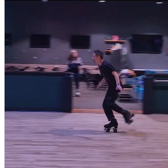 Kevin demonstrating roller skating skills at Remix in Manchester, NH